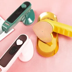 Handhållen minidamptång reseportabel klädångare för kläder rosa