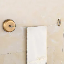 Online Kraftig infällbar torkvinda i rostfritt stål 2,7 meter (max) för torkning i badrumstvätt, kromfinish, rund (borstad antik mässing)