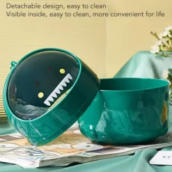 Söt liten dinosaurieformad mini-soptunna för skrivbordet